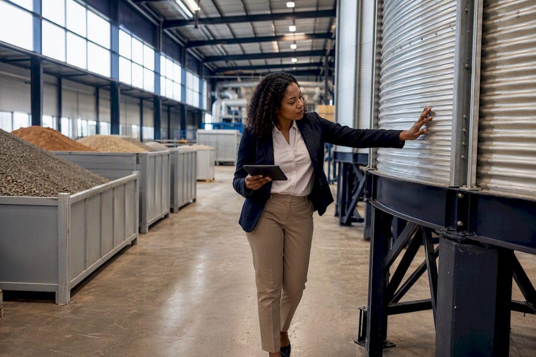 Investor inspecting commodity storage containers