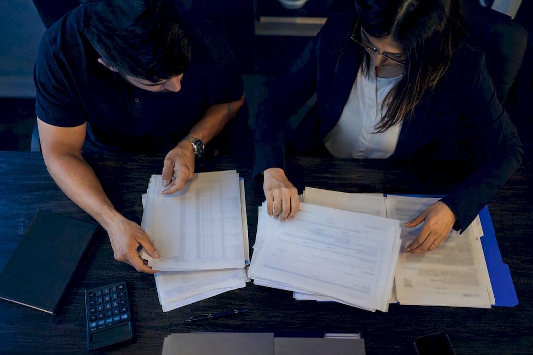 Investor organizing rental property loan records