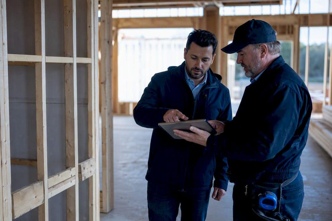 Investors and Brokers: How Advance Rate Grids Turn 'Zero Down' Into 100% LTC 1 Investor verifying construction milestone progress